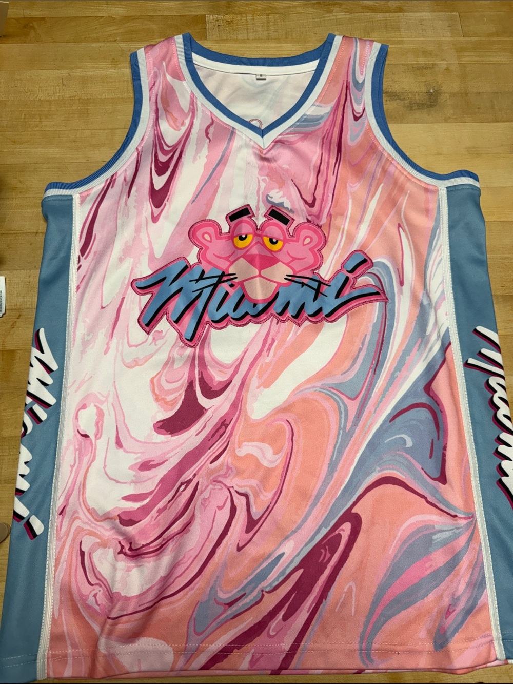 Pink Swirl Basketball Jersey with Pink Panther Graphic